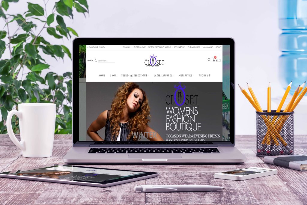 The Closet women's fashion boutique website shown on a laptop