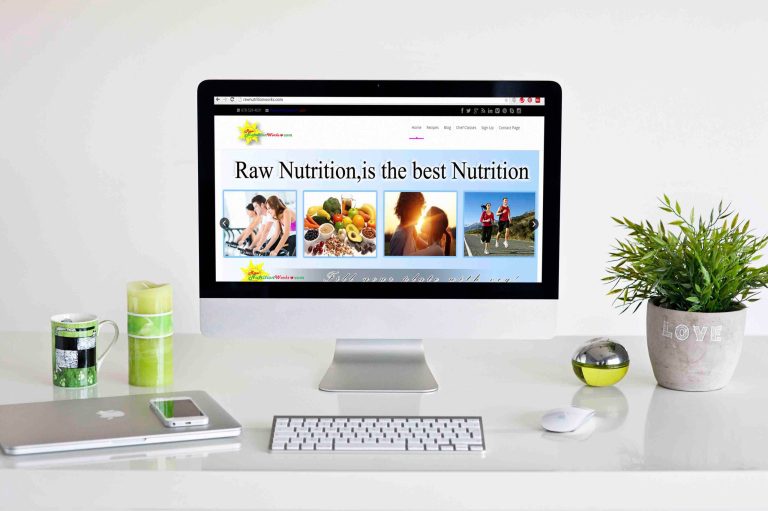 Nutrition website with the headline "Raw Nutrition is the best Nutrition" on a desktop monitor