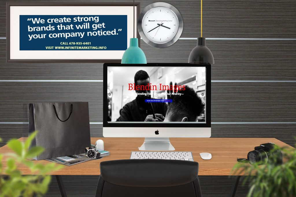 Office mockup with the Blendin Images website on a desktop monitor and a poster reading "We create strong brands that will get your company noticed"